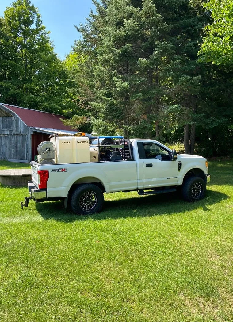 The Wash Works truck loaded with pressure washing equipment