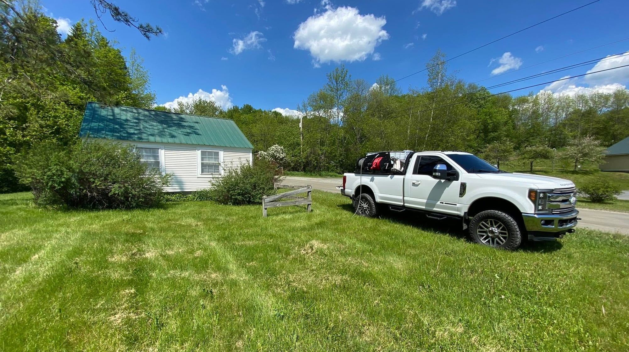 Wash Works truck parked outside a freshly washed Vermont home